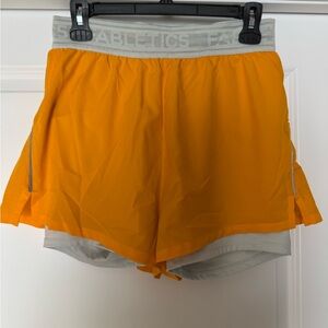Fabletics Orange and Gray Women's Perforated Run 5” Shorts